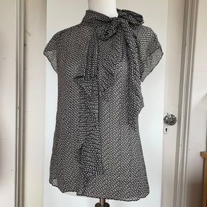 Sheer silk ruffle sleeveless blouse